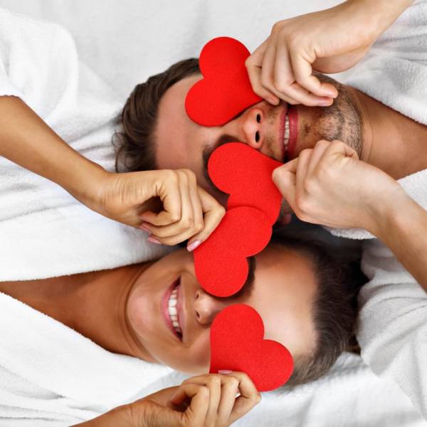 Picture of adult happy couple relaxing in spa salon